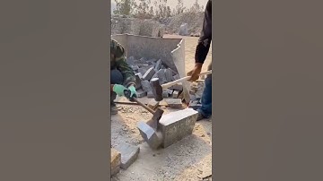 Two Stone Masons, One Rhythm—Splitting Rock with Precision