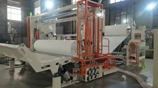 Jumbo roll slitting and rewinding machine 