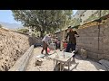 Construction in a rural family.  Ali's cooperation with Babak in building a warehouse @par8484