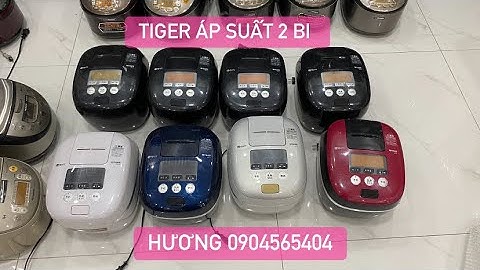 Nồi cao tần Tiger áp suất 2 bi xoong gốm siêu dày , cơm rất thơm ngon . Cực mới !!!