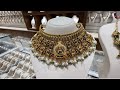 Pothys swarnamahal 8 grams onwards beads nagas emerald necklace  wedding gold vaddanam designs