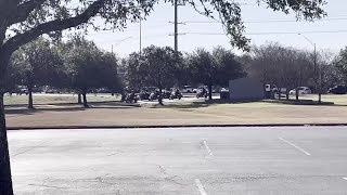 The funeral procession for Navasota Police Sergeant Mark Butler arrives at Central Church in College