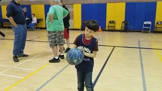 8 year old with autism handles a basketball