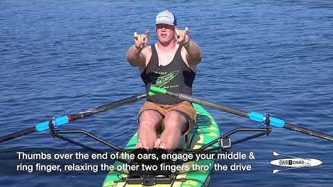 Hands gripping the oar handle: Rowing Basics with Adam Kreek, gold medal Olympian