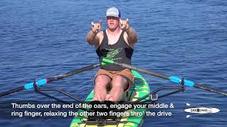 Hands gripping the oar handle: Rowing Basics with Adam Kreek, gold medal Olympian