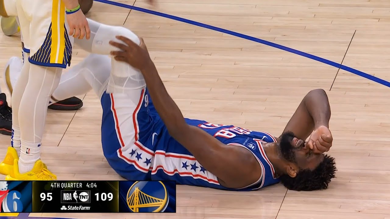 Sixers' Joel Embiid exits with apparent knee injury vs. Knicks
