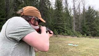 ✅out the older Winchester model 94-22 magnum caliber enjoying shooting some cans