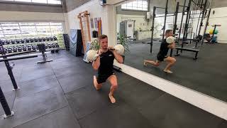 Double Kettlebell Alternating Reverse Lunge demonstration