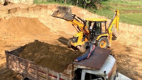 JCB Backhoe 3DX  Machine Loading Soil Into Tipper Dump - JCB Cutting Soil