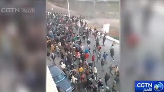 مقتل 18 مهاجرا بعد محاولة اقتحام جيب مليلية الإسباني من المغرب
