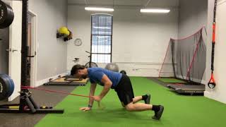 Bear crawl position w/ banded lat pull
