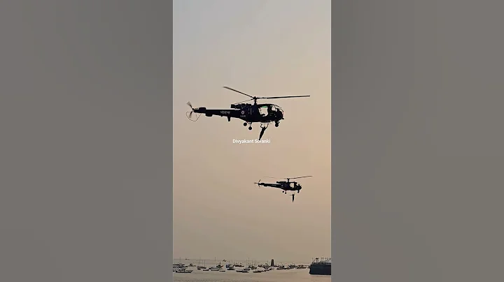 Indian Navy Commander show their rescue operation skills during the Navy Day Celebrations in Mumbai