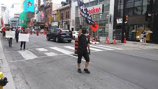 2020年8月30日下午,多倫多近1,000人集會、遊行,呼籲加拿大政府採取實際行動,制裁中共,實施「安全港計劃」,營救受迫害的香港人。