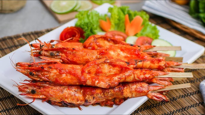 Sate udang pedas yang lezat dengan bumbu rempah khas, sempurna untuk pecinta hidangan pedas