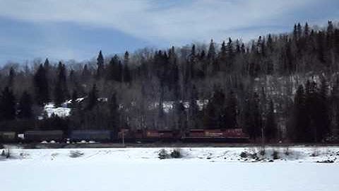 Nipigon skiing on Nipigon Bay with C.P.R.  heading for Nipigon.