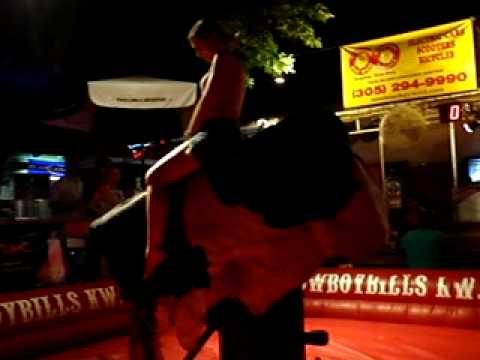 My wife after a few drinks giving bull riding a try! That's my girl!