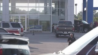 Explosion at car dealership