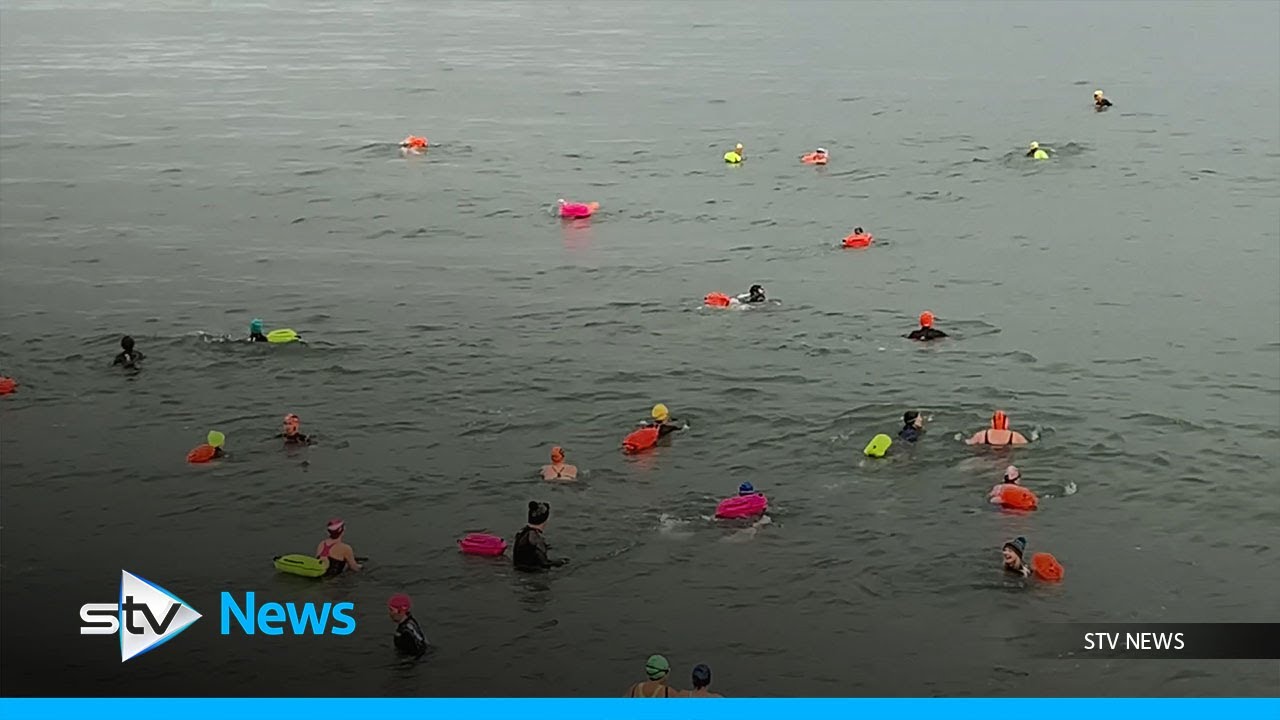 A group of wild swimmers gathered at Aberdeen beach on the last day of the year