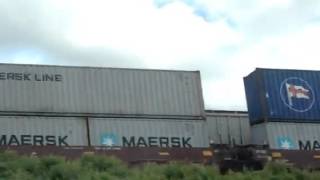 Tail end of KCS train meets BNSF, SL, Texas
