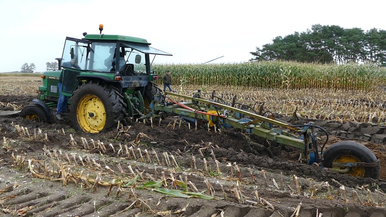 John Deere 4040 Gets Pulled Out Of The Mud by a John Deere 4440 | Muddy Ploughing 2017