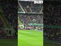 Moment Celtic ultras break silent protest and burst into song after 12 minutes against Hibs
