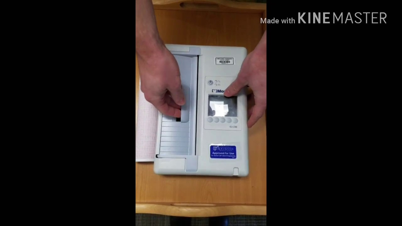 Loading Paper - Mortara Eli 230 ECG Machine