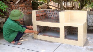 Thumbnail Build an outdoor bbq grill from red bricks and cement