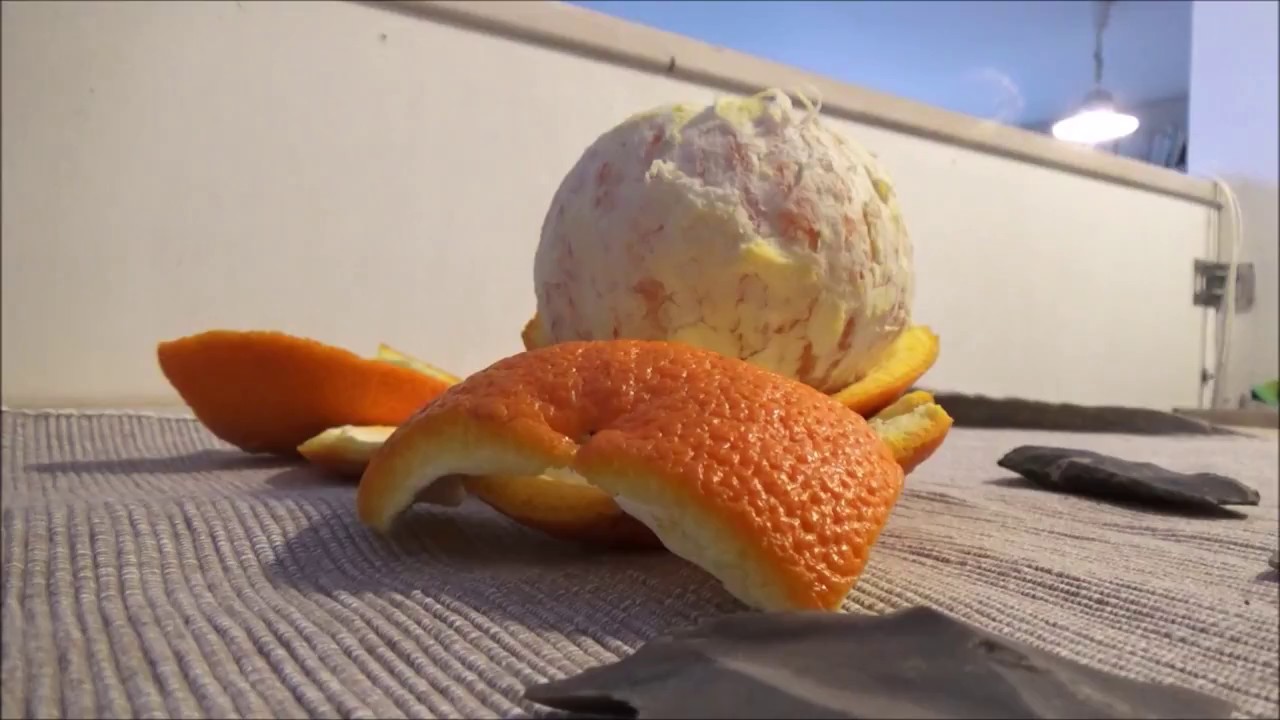 Flint vs Orange Skin - Prehistoric, Clean, Easy way to peel an orange