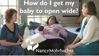 How do I get my baby to open wide?