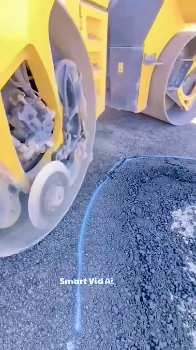 This machine cuts & levels roads like magic 🚜 #shorts #heavymachinery