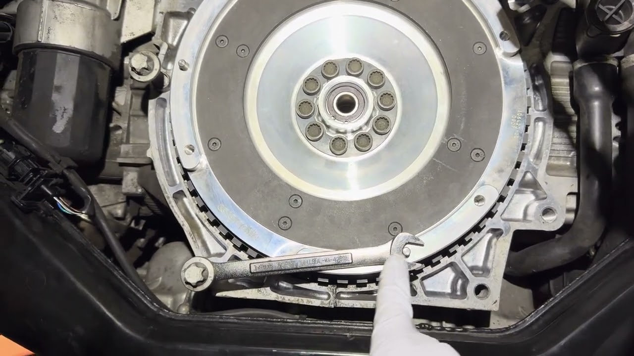 Lock a Flywheel for Torquing Bolts (Free / no special tool)