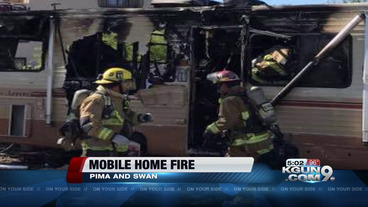 Mobile home fire sends one firefighter to the hospital - YouTube