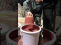 Clay pots painted brick orange are shaken gently afterward, helping surfaces dry more evenly #viral