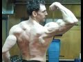 Back and biceps muscles posing natural bodybuilder and trainer victor costa