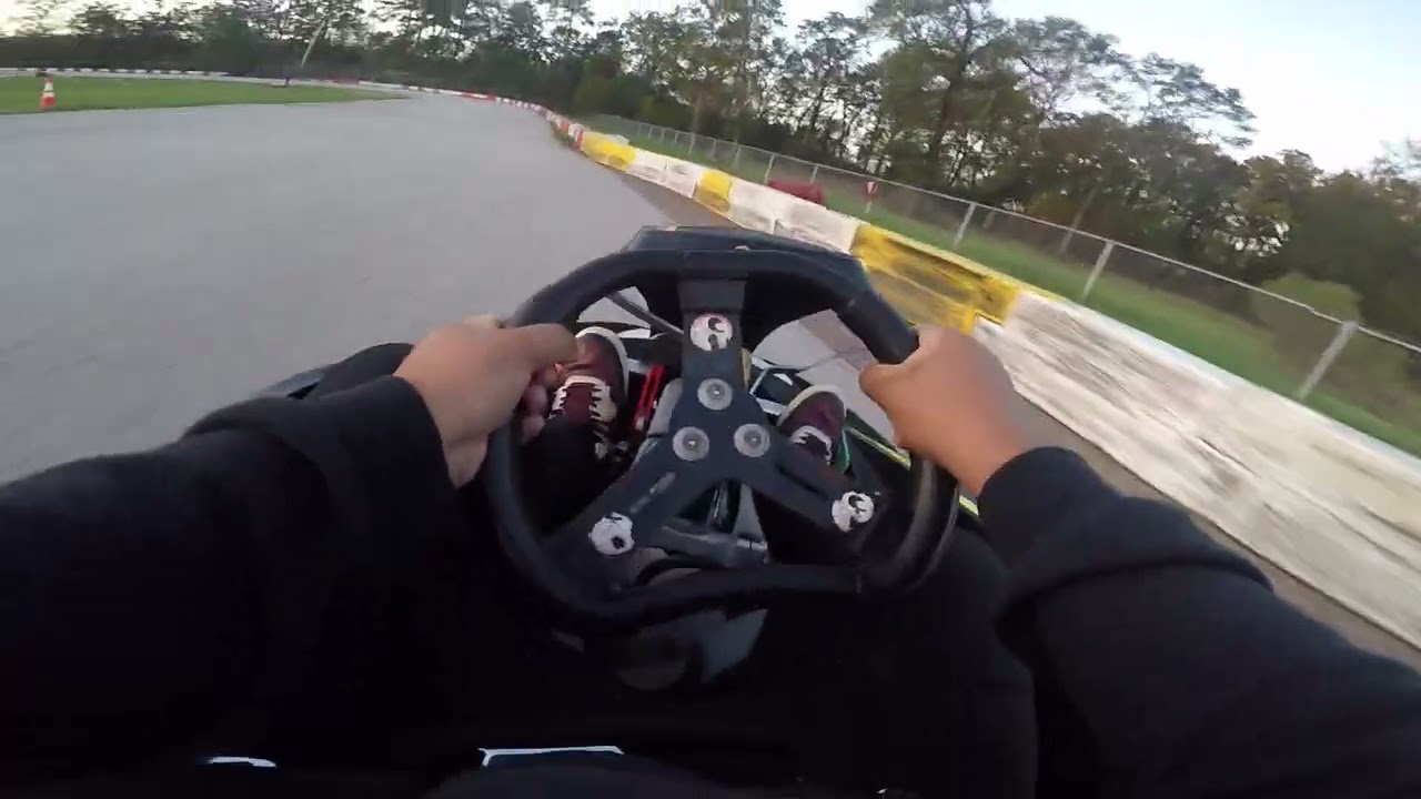 Friendly competition in the Houston Karting Complex Track(almost hit barriers)