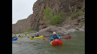 Tracy packrafting the Gunnison Gorge
