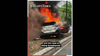 Woman escapes from car moments before it bursts into flames