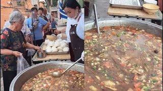 This kind Chinese lady is giving free dinner to the old people in rural areas