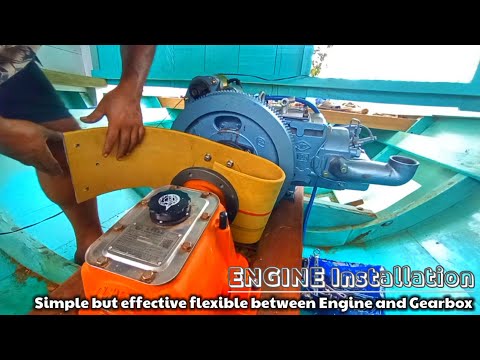 installing two engine units on a wooden boat to the trial stage