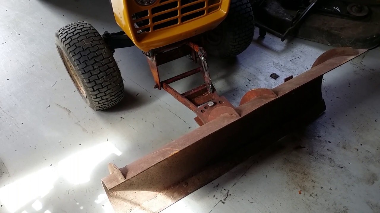 Snow plow is installed and lift mechanism is built and working. Gilson