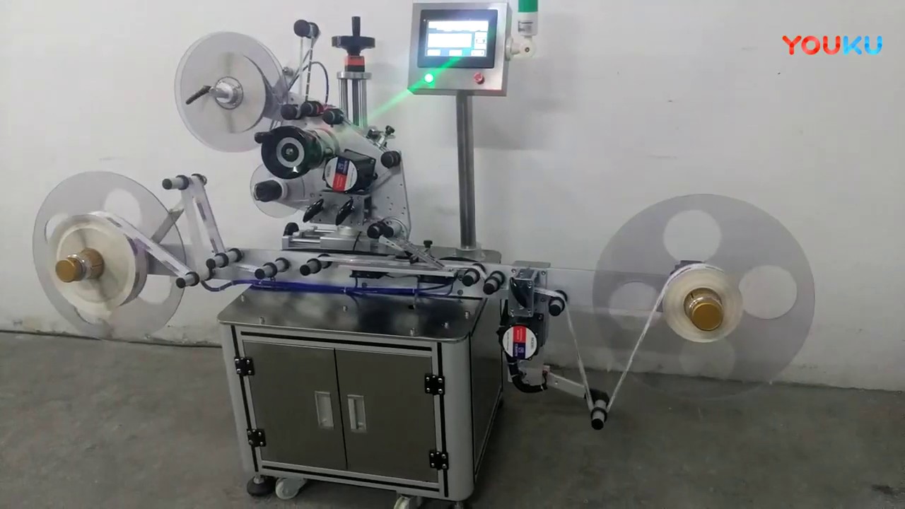 Automatic roll film labeling machine - YouTube