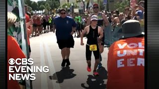 Role model inspires boy with Down Syndrome to complete mini-triathalon