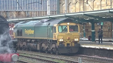 The Class 66 Freightliner No.66525 with Rail Containers at Carlisle. (FT. LMS Black 5 No.45407)