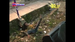 PERSON DANCING FALLS OFF STAGE