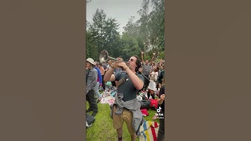 Random Guy plays trumpet at a ThunderCat concert