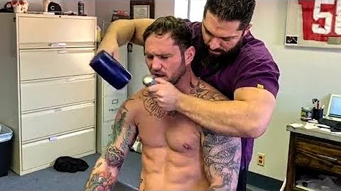 Watch UFC Coach get his dislocated rib hammered ba...