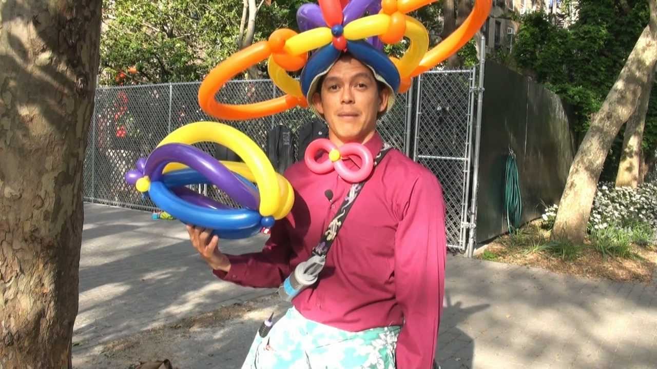 Balloon hat making balloon twisting artist NYC_IGE Entertainment