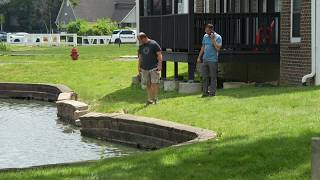 Death investigation underway after 19-month-old pulled from Lawrence retention pond