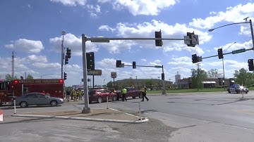 Two-vehicle crash snarls traffic at busy intersection