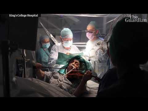 Woman plays violin while undergoing brain surgery